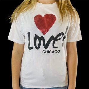 White T-shirt that says Love Chicago with a red heart.